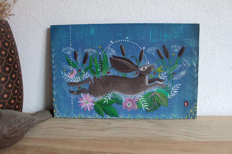 Meadow hare, painting running in the countryside